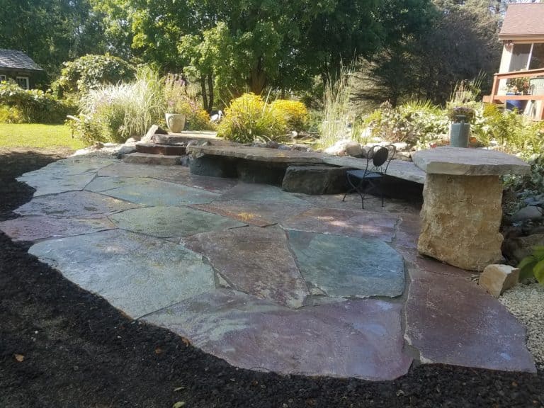 Slab stone patio with steps walk table and seats 1